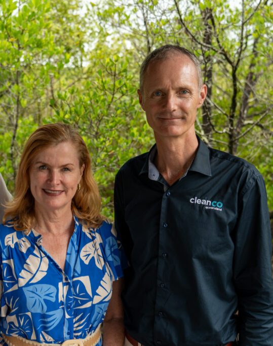 A photograph of CleanCo CEO Tom Metcalfe with an official from North Queensland Airports.