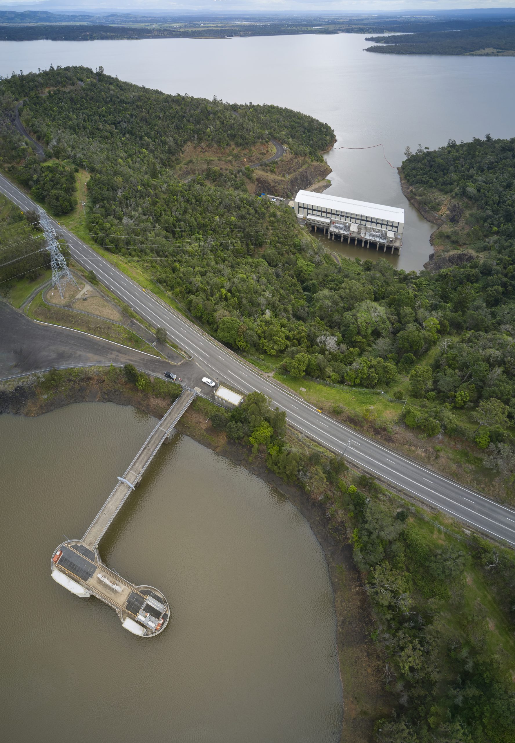 A photograph showing an aerial view of both Wivenhoe Power Station and Splityard Creek Dam