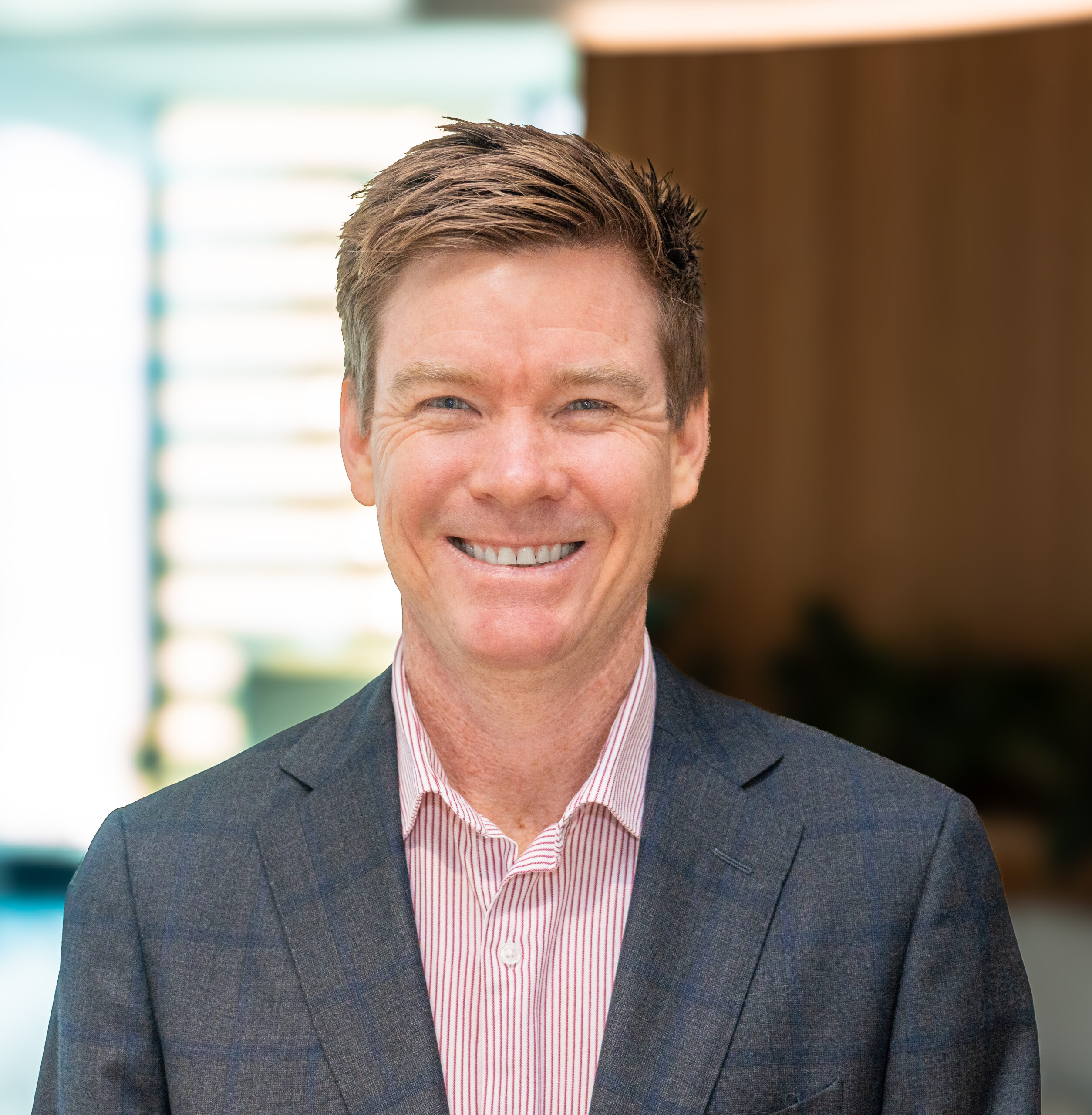 A colour photograph of CleanCo Director Government Relations, James McGarry, smiling at the camera