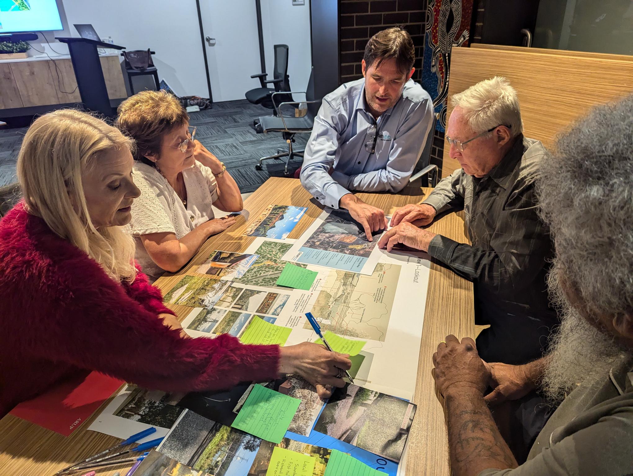 Swanbank CRG members and CleanCo staff look at concept designs